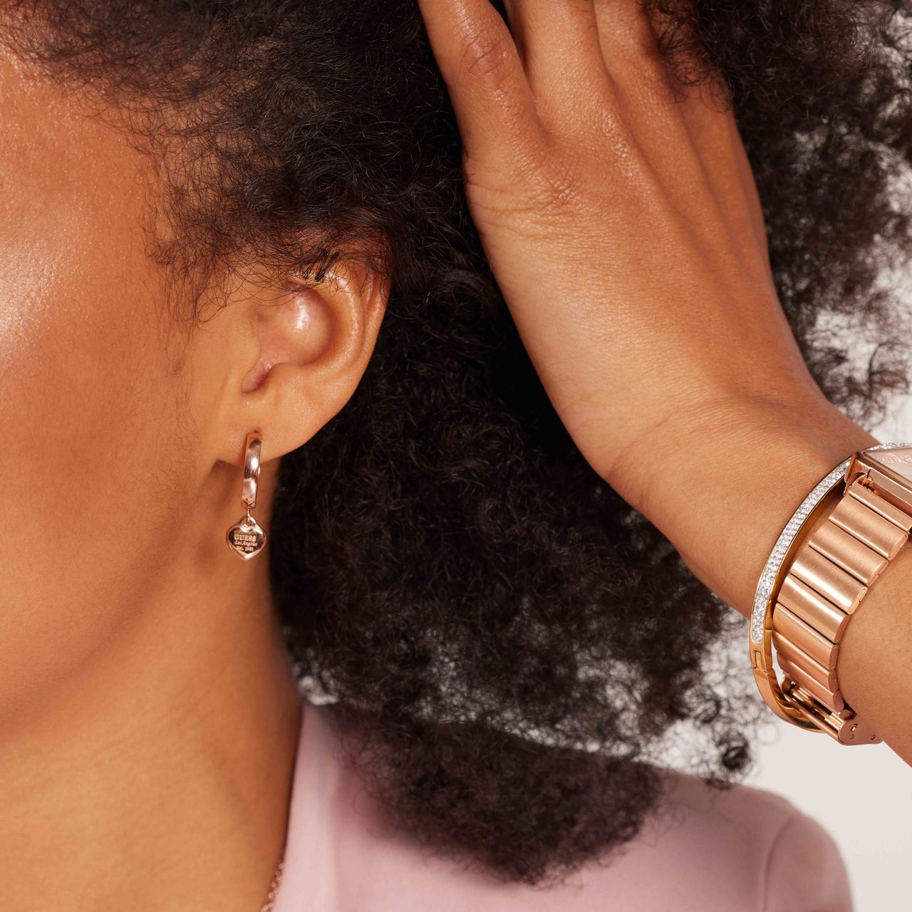 Guess stainless steel roséplated oorringen met hanger hart voor dames