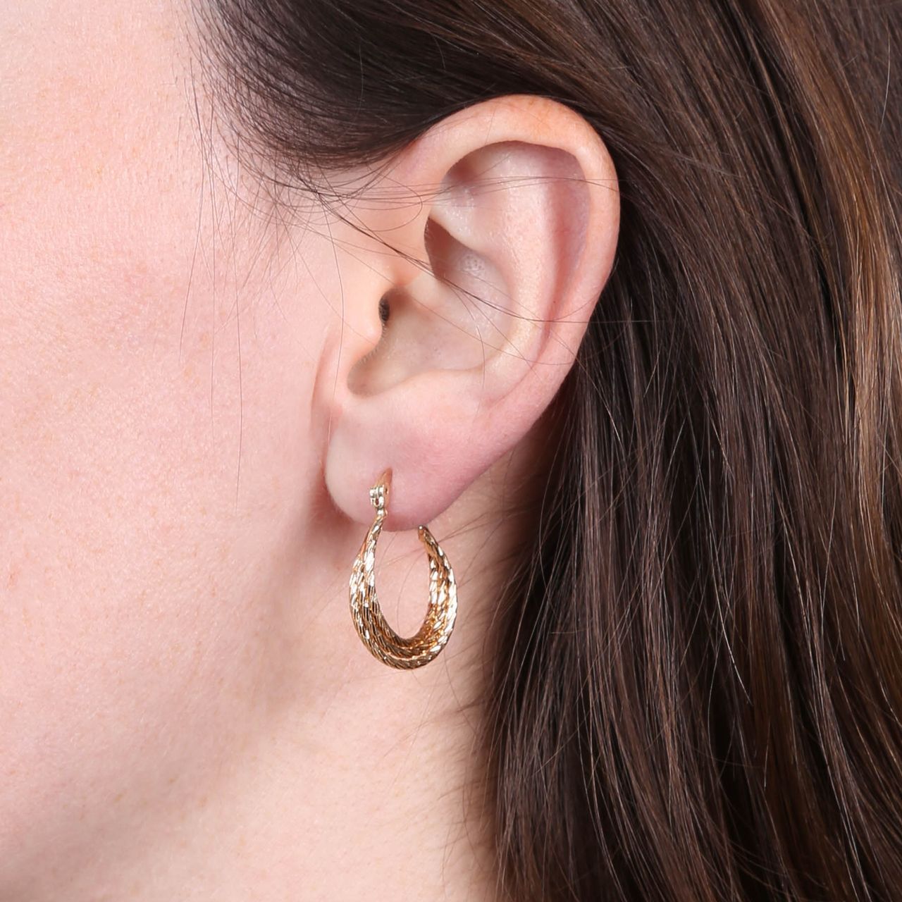 Goudkleurige bijoux oorringen