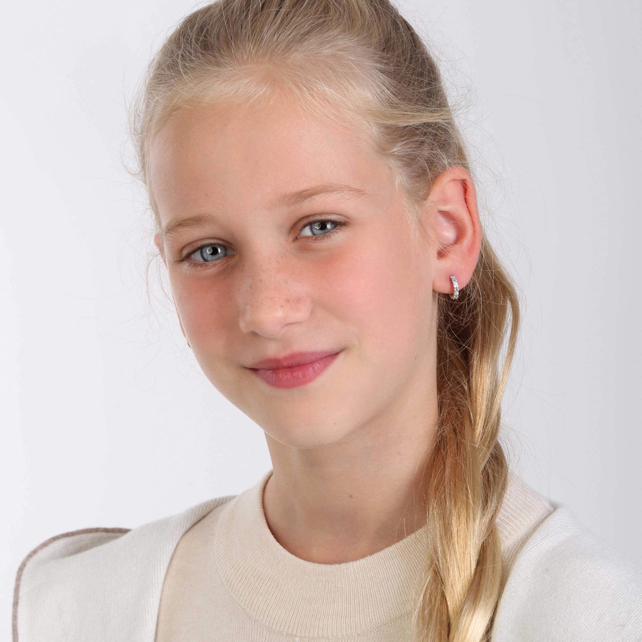 Zilveren kinderoorbellen witte/aqua zirkonia