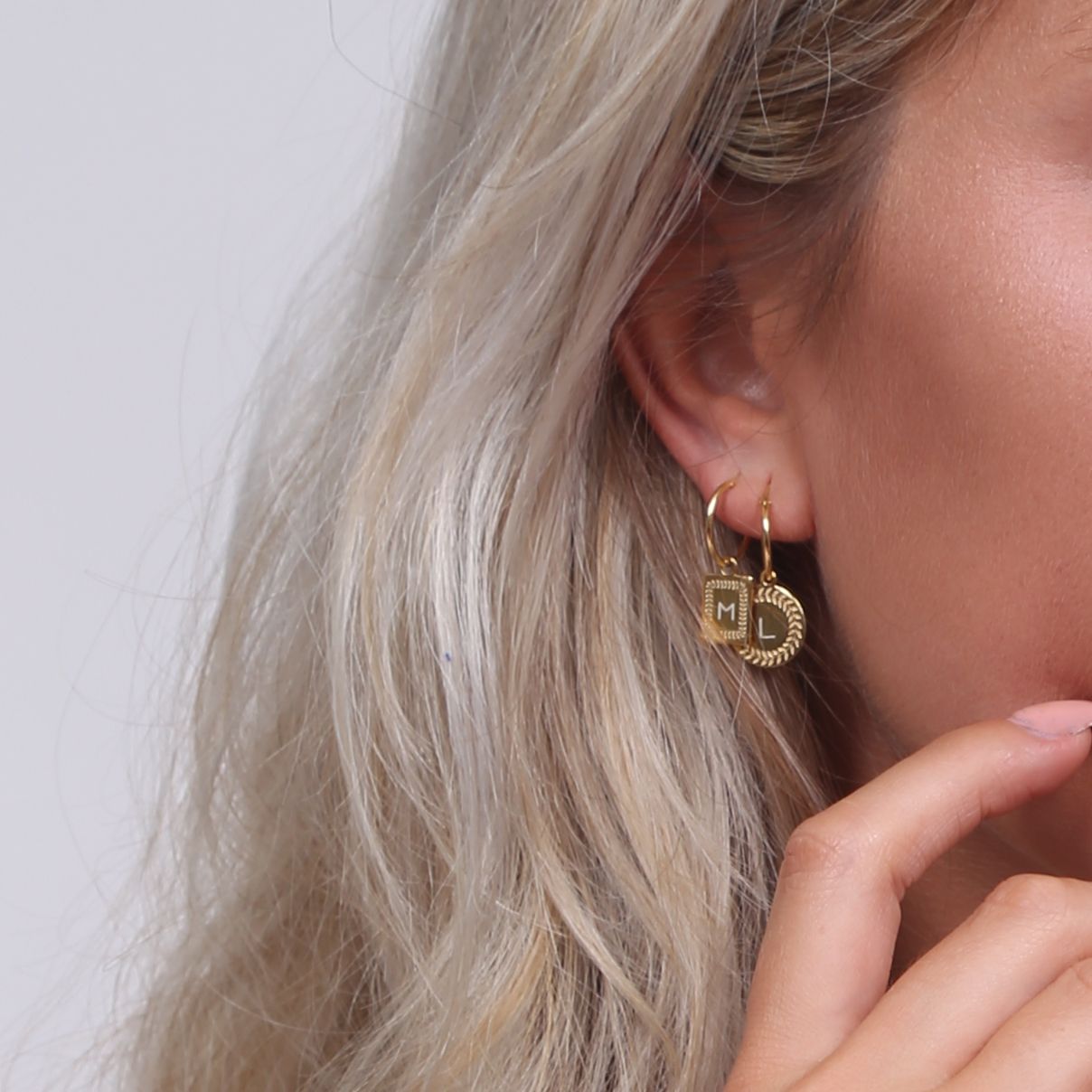 Zilveren oorbellen goldplated Romeinse krans