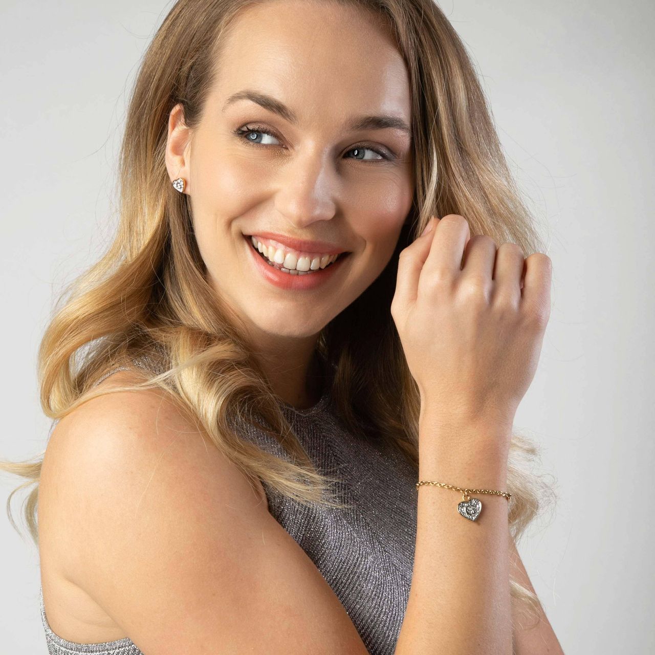 Guess stalen goldplated oorknoppen hart met kristal voor dames
