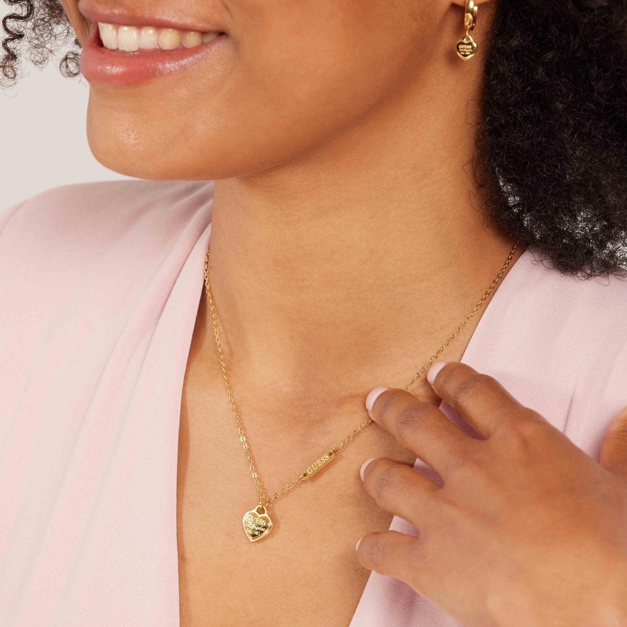 Guess stainless steel goldplated ketting hanger hart logo