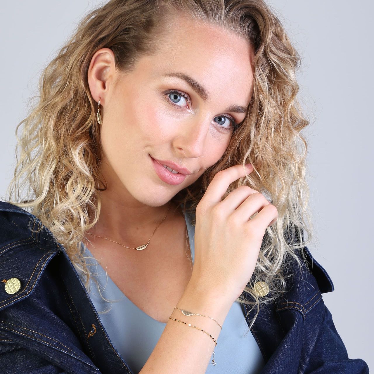 14 karaat geelgouden armband met veer
