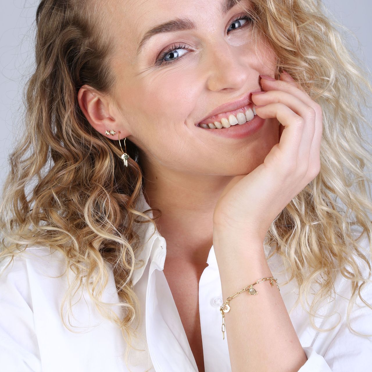 Zilveren goldplated bedelarmband met zirkonia voor dames