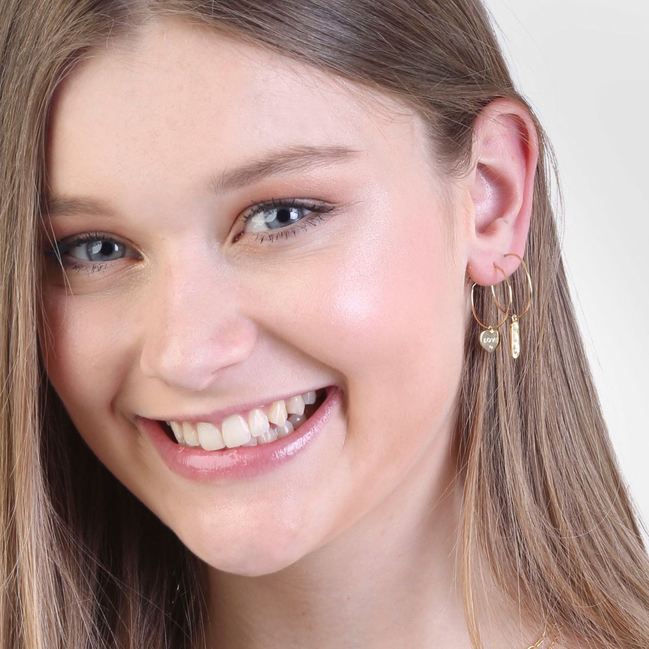 Zilveren goldplated oorringen met hanger bar