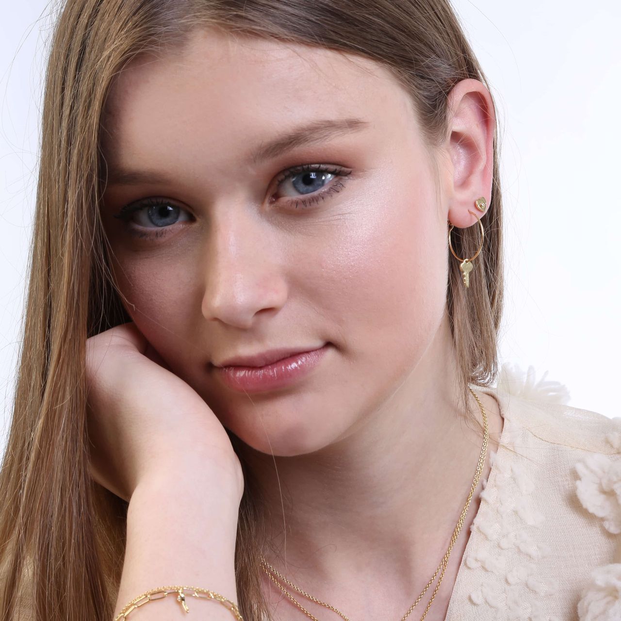 Zilveren goldplated oorringen met hanger sleutel