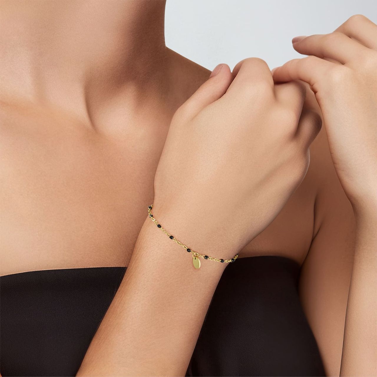 Stainless steel armband gold graveer ovaal zwart emaille