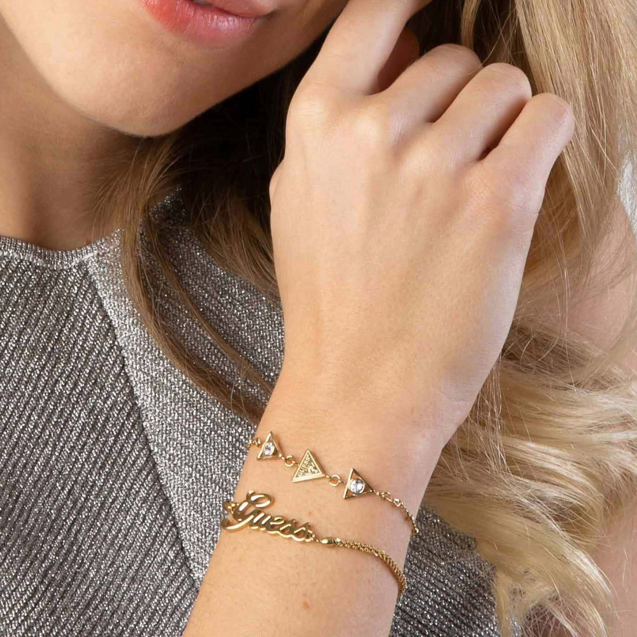 Guess stalen goldplated armband Guess LOGO POWER