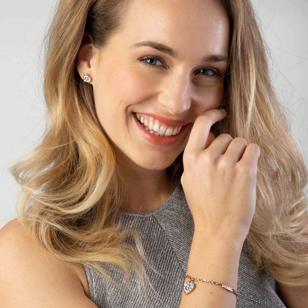 Guess stainless steel roséplated oorknoppen hart met kristal voor dames