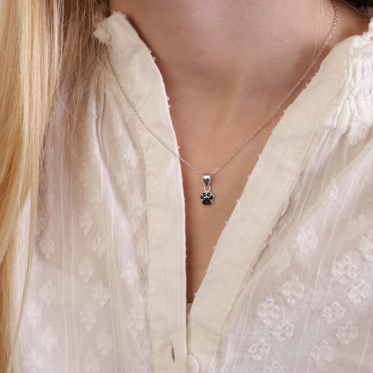 Zilveren kinderketting hanger hondenpoot kristal