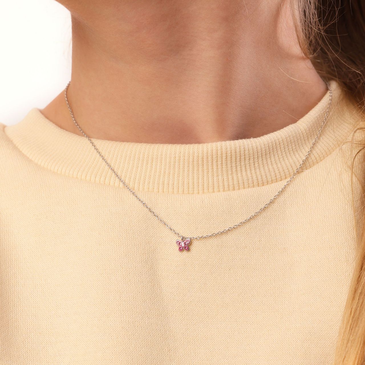 Zilveren kinderketting vlinder roze kristal