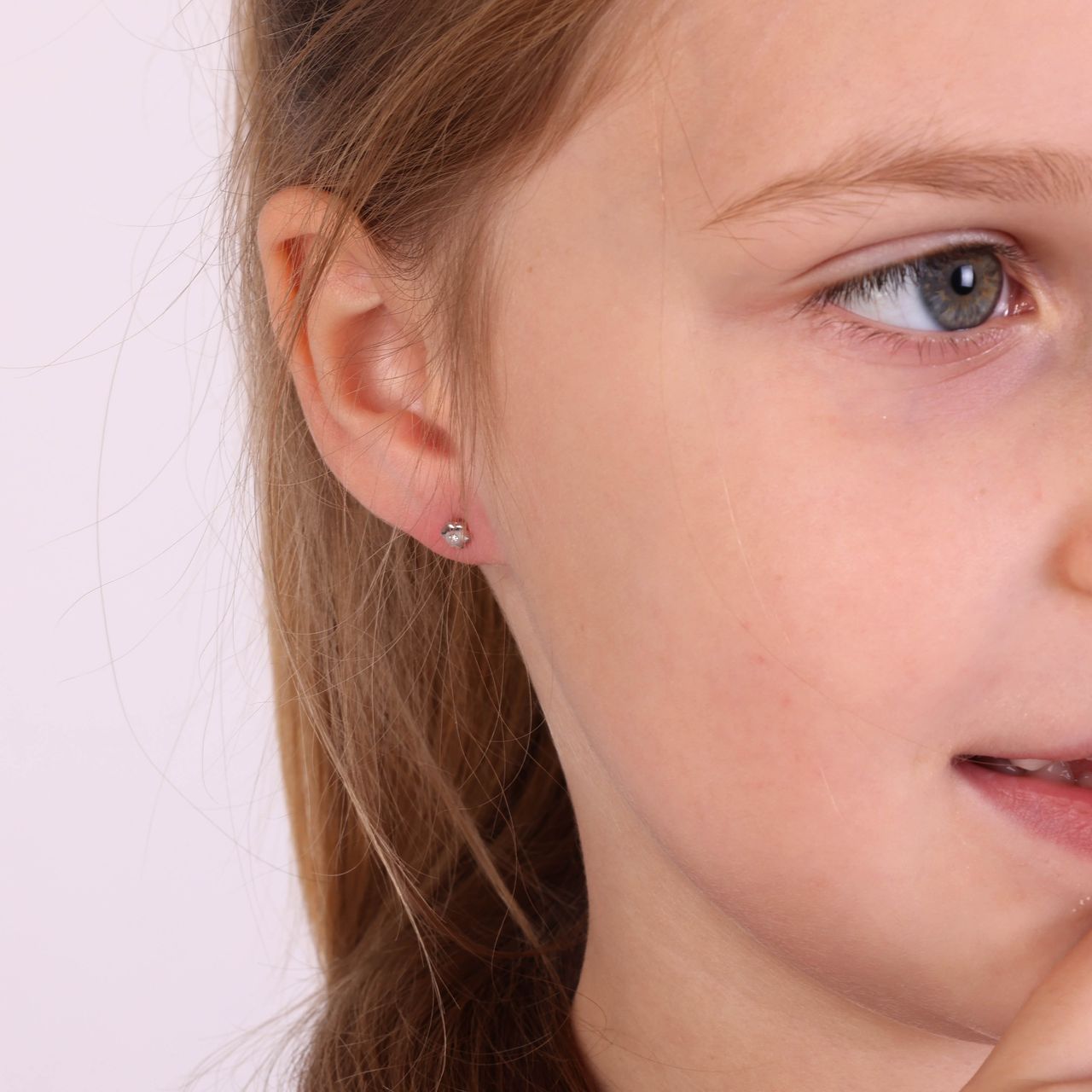 Zilveren kinderoorbellen bloem wit zirkonia