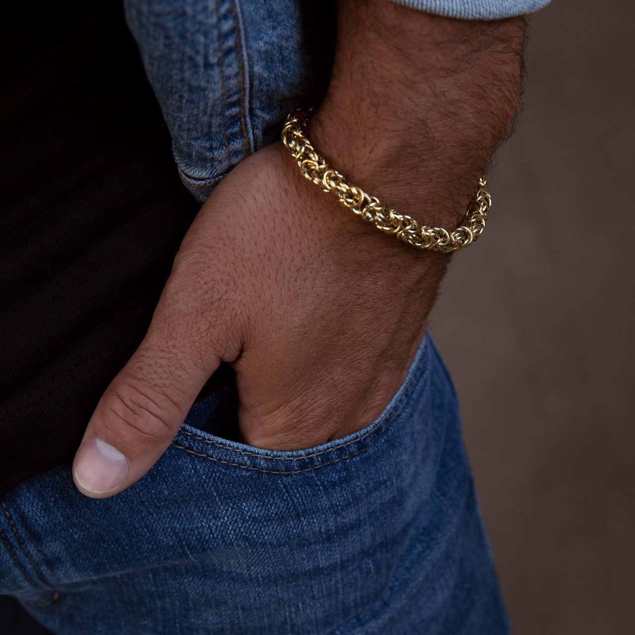 Gerecycleerd stainless steel goldplated armband met koningsschakel