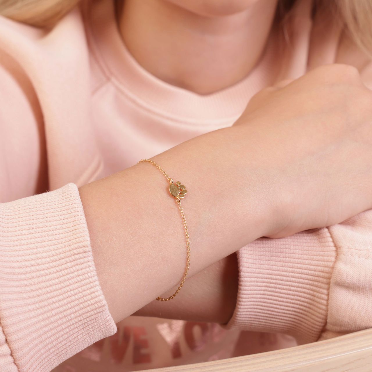 Zilveren goldplated kinderarmband met hondenpoot