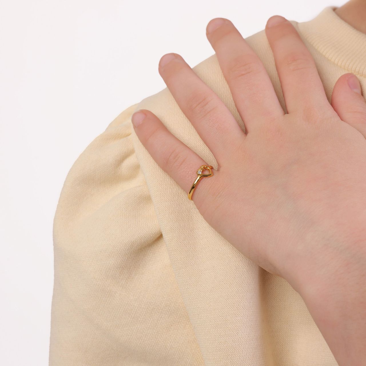 Zilveren kinderring gold met open hart en zirkonia