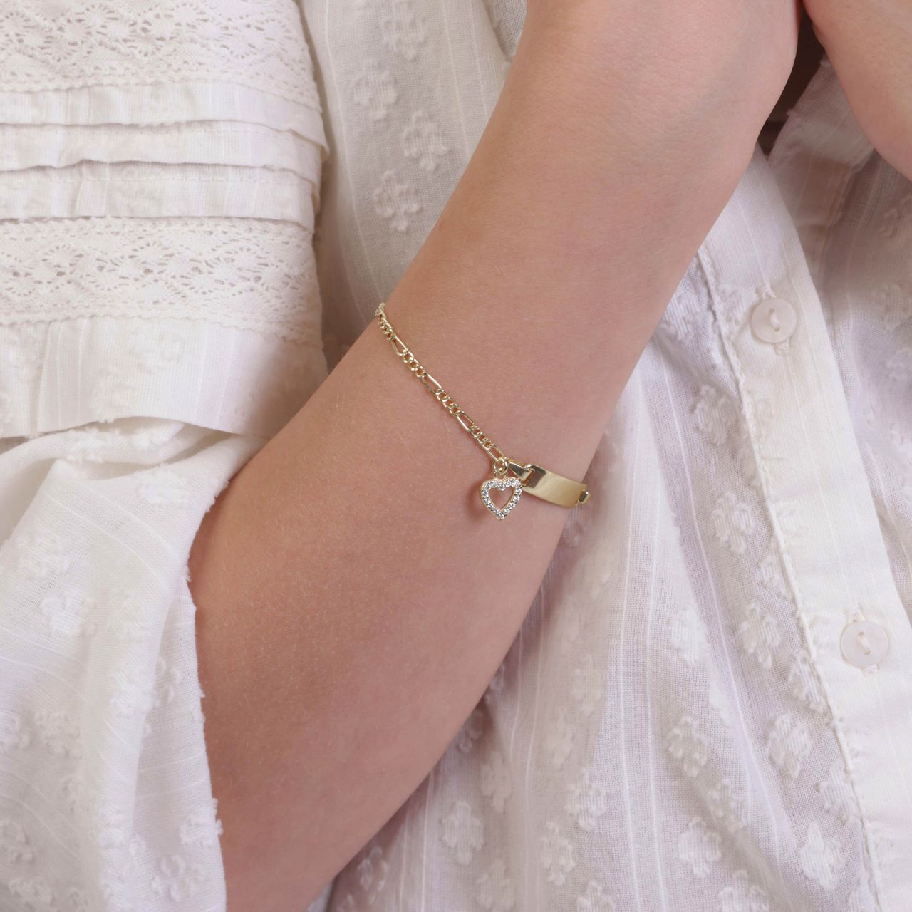 Zilveren gold kinderarmband hart witte zirkonia