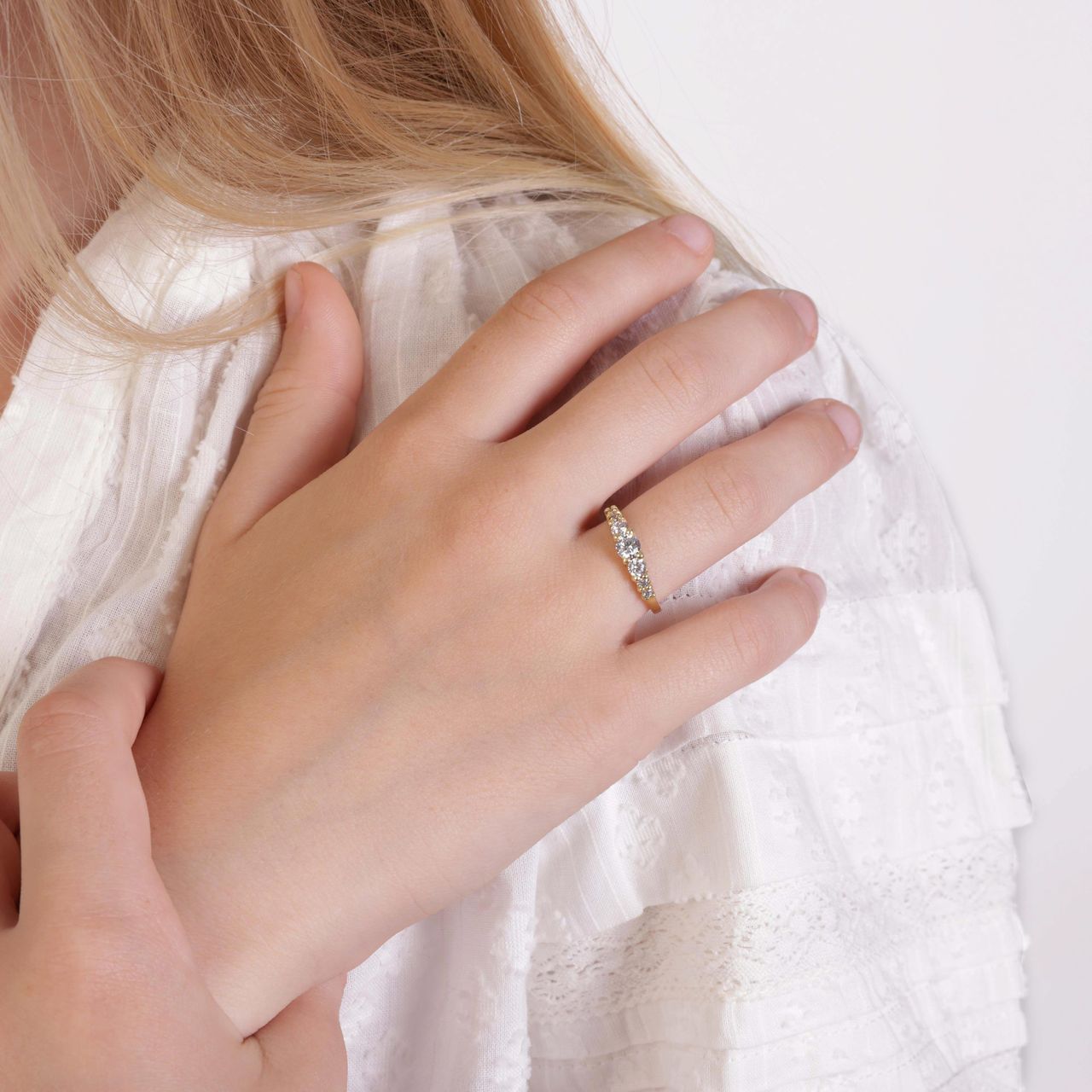 Zilveren goldplated kinderring met witte zirkonia
