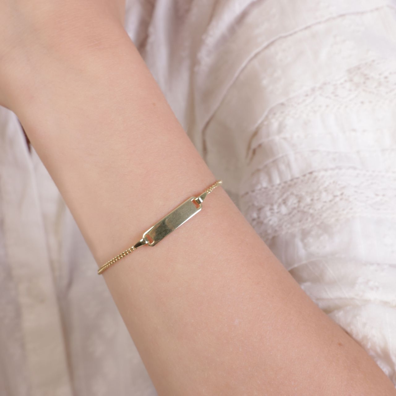 Zilveren goldplated kinderarmband plaat
