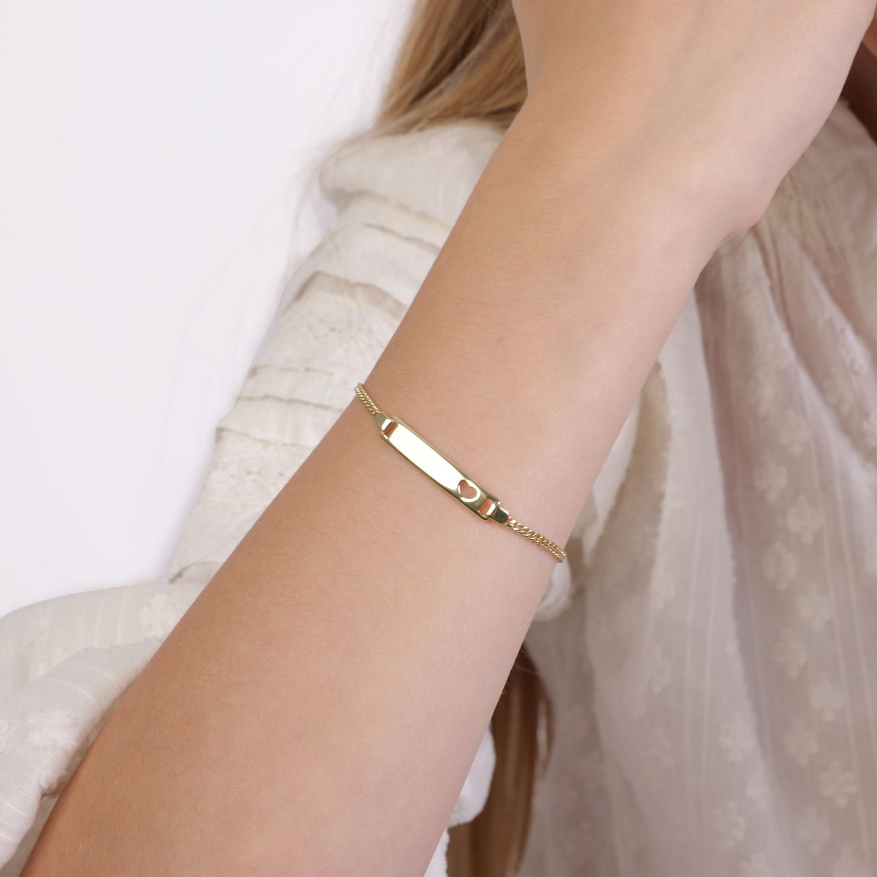Zilveren goldplated kinderplaatarmband hart