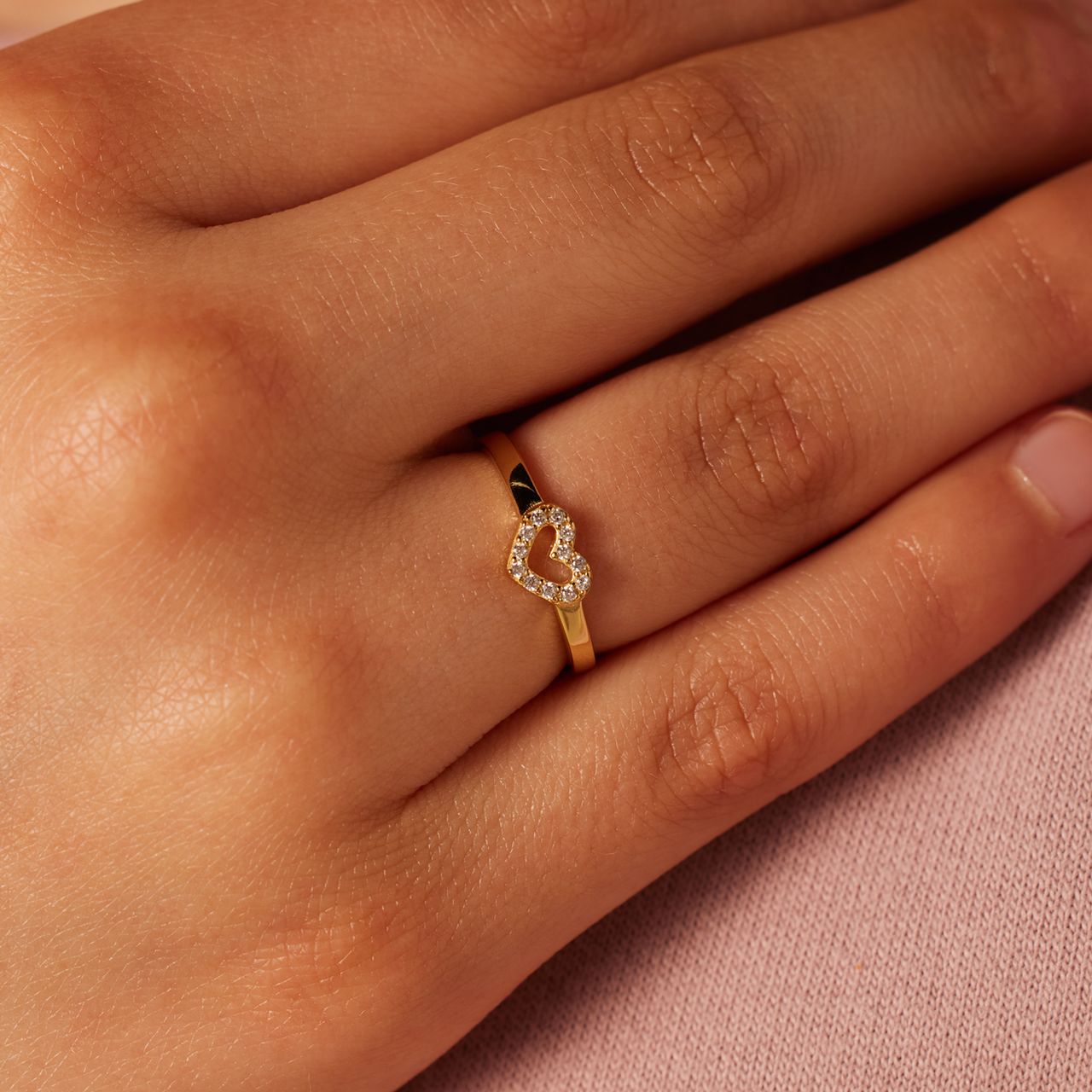 Zilveren goldplated kinderring hart met zirkonia