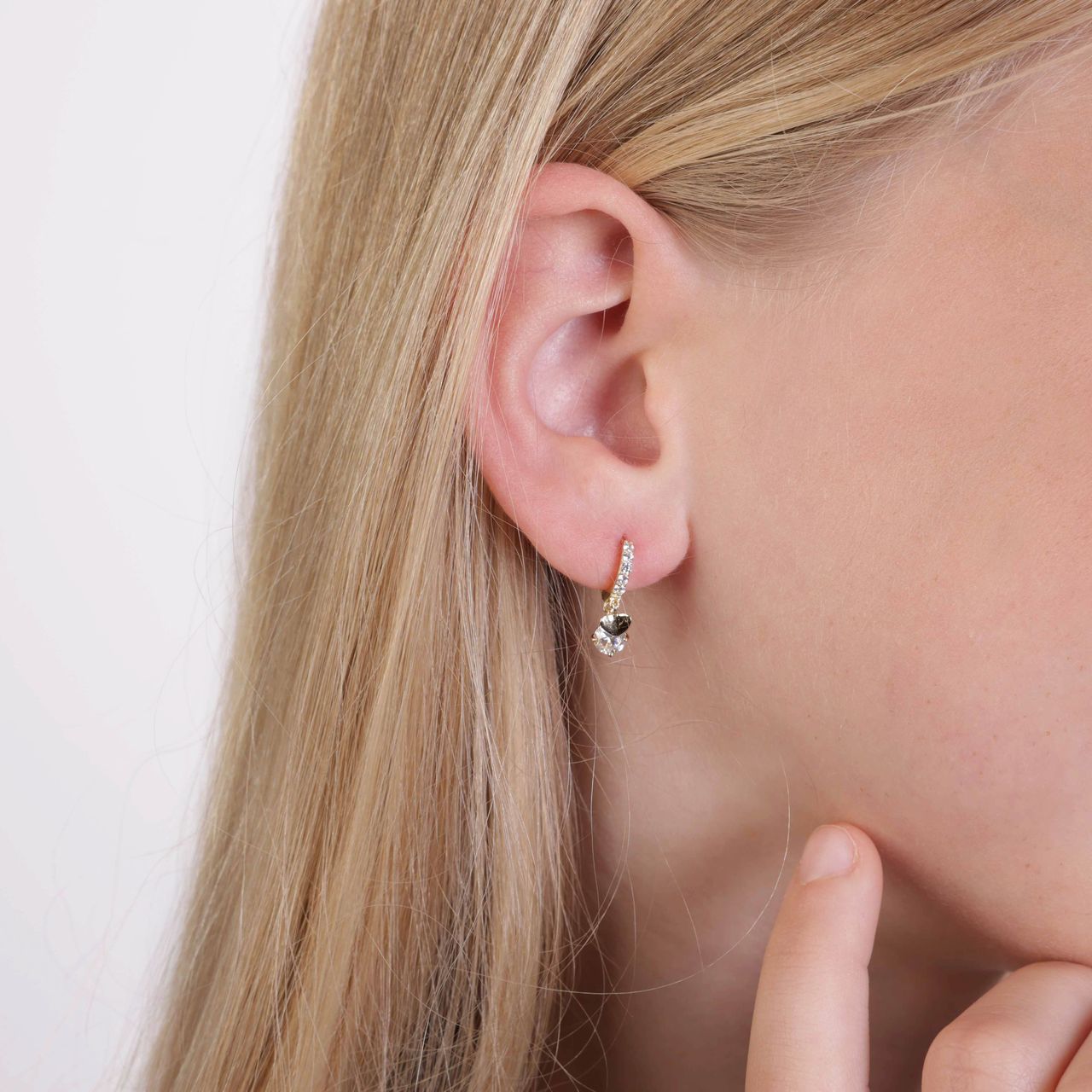 Zilveren goldplated kinderoorringen hart met zirkonia