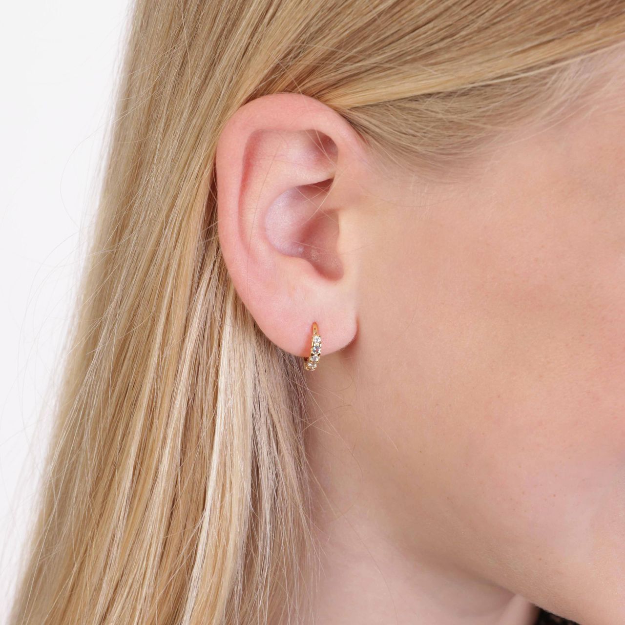 Zilveren goldplated kinderoorringen met witte en aqua zirkonia