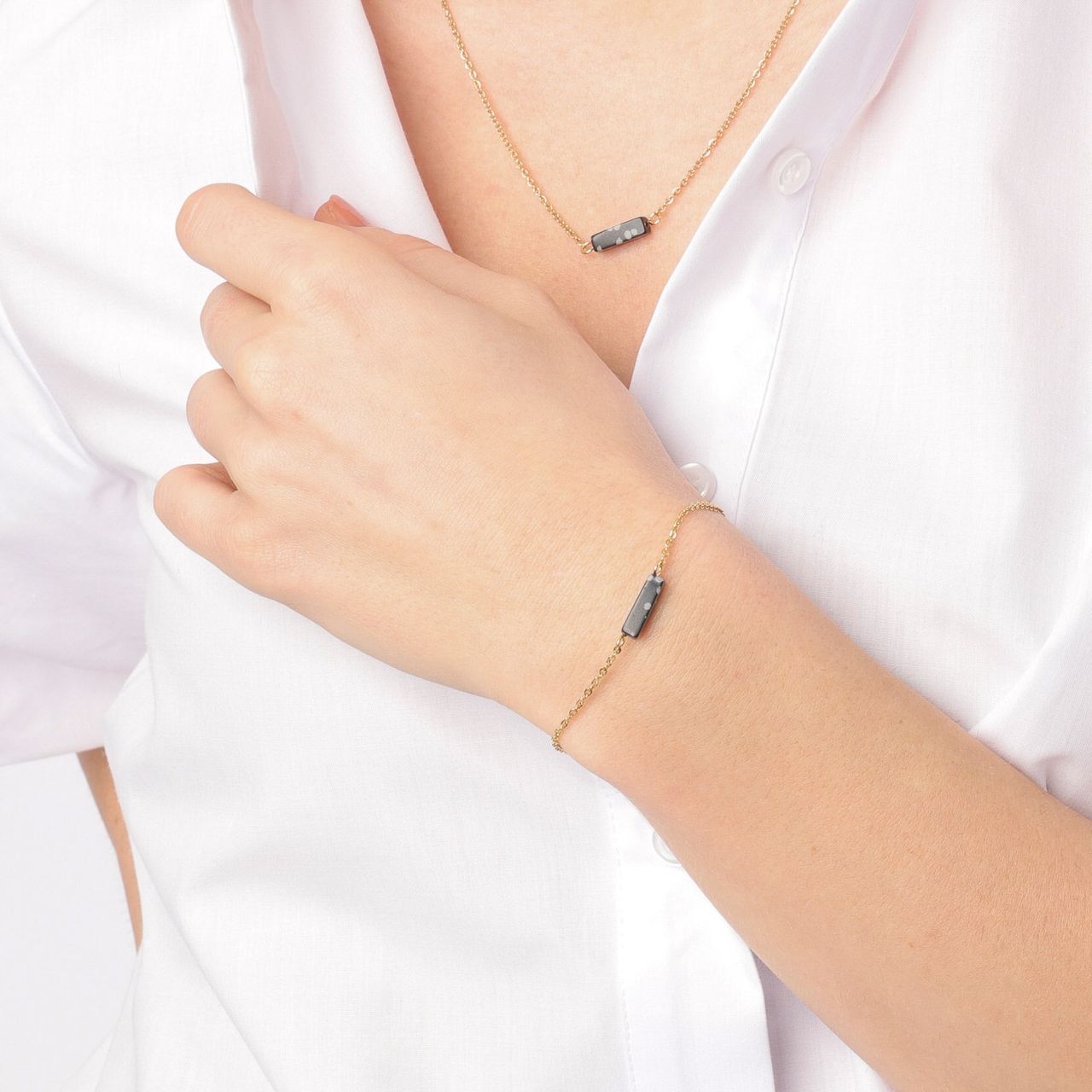Stainless steel goldplated fantasiearmband met hanger met black jasper voor dames