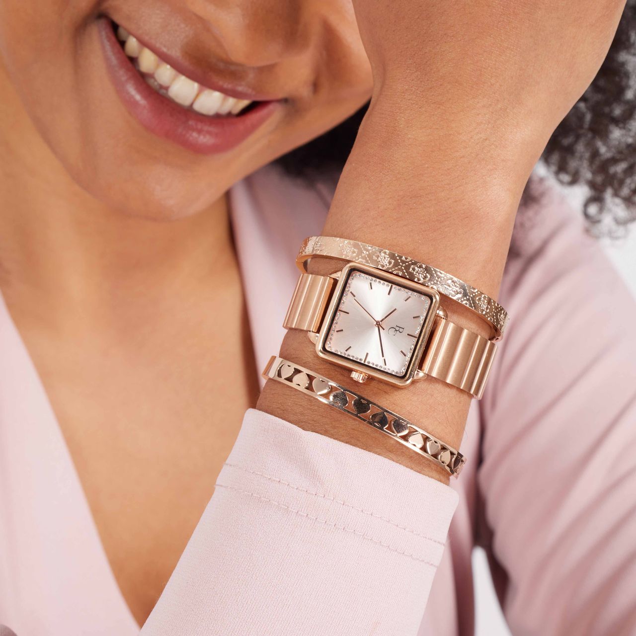 Guess stalen roséplated bangle met kristal voor dames