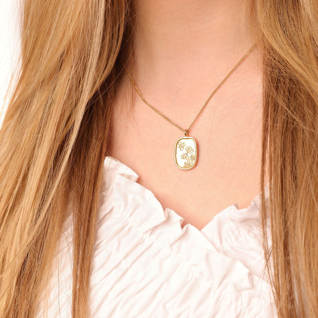 Stalen goldplated ketting met hanger bloemen