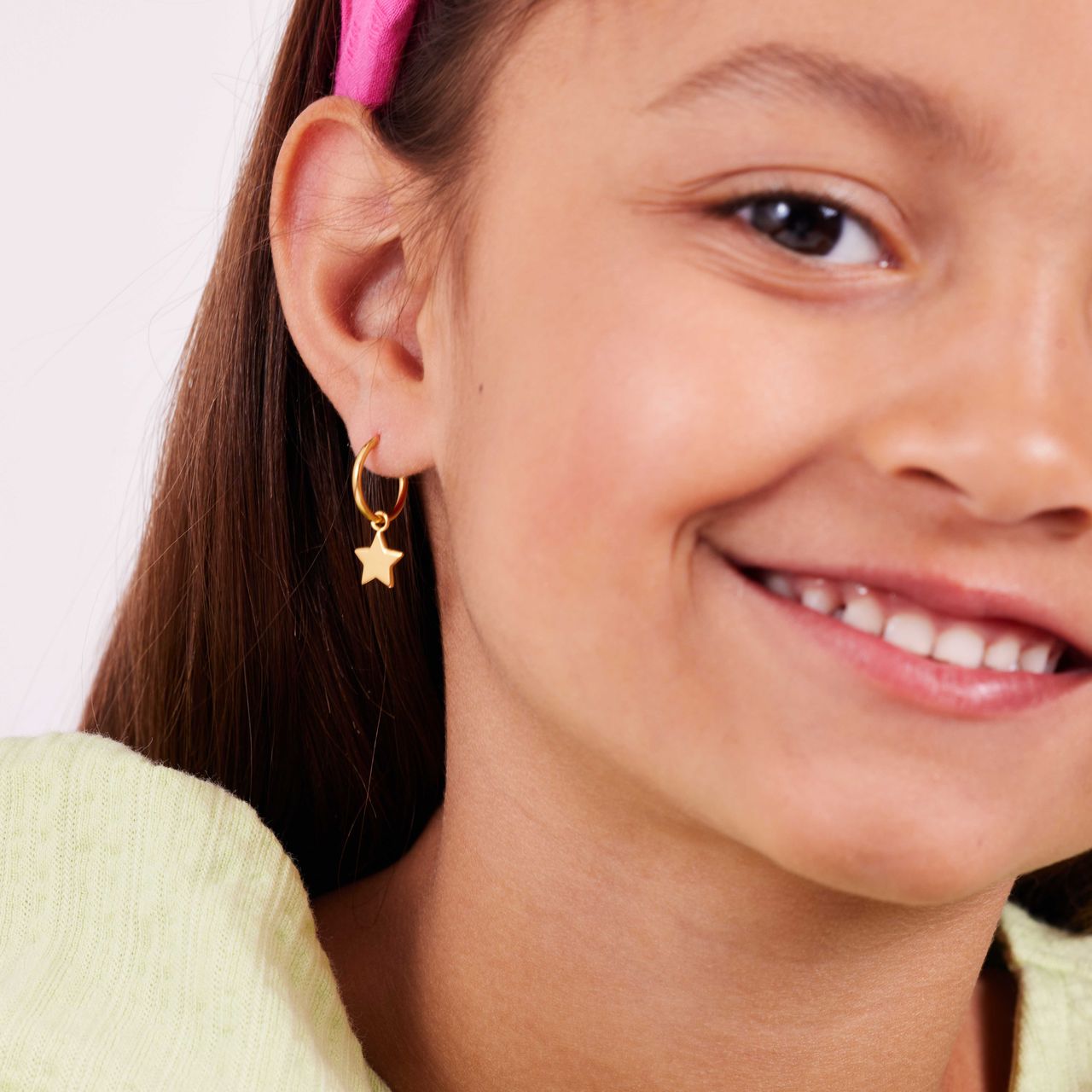 Zilveren goldplated kinderoorringen met hanger ster