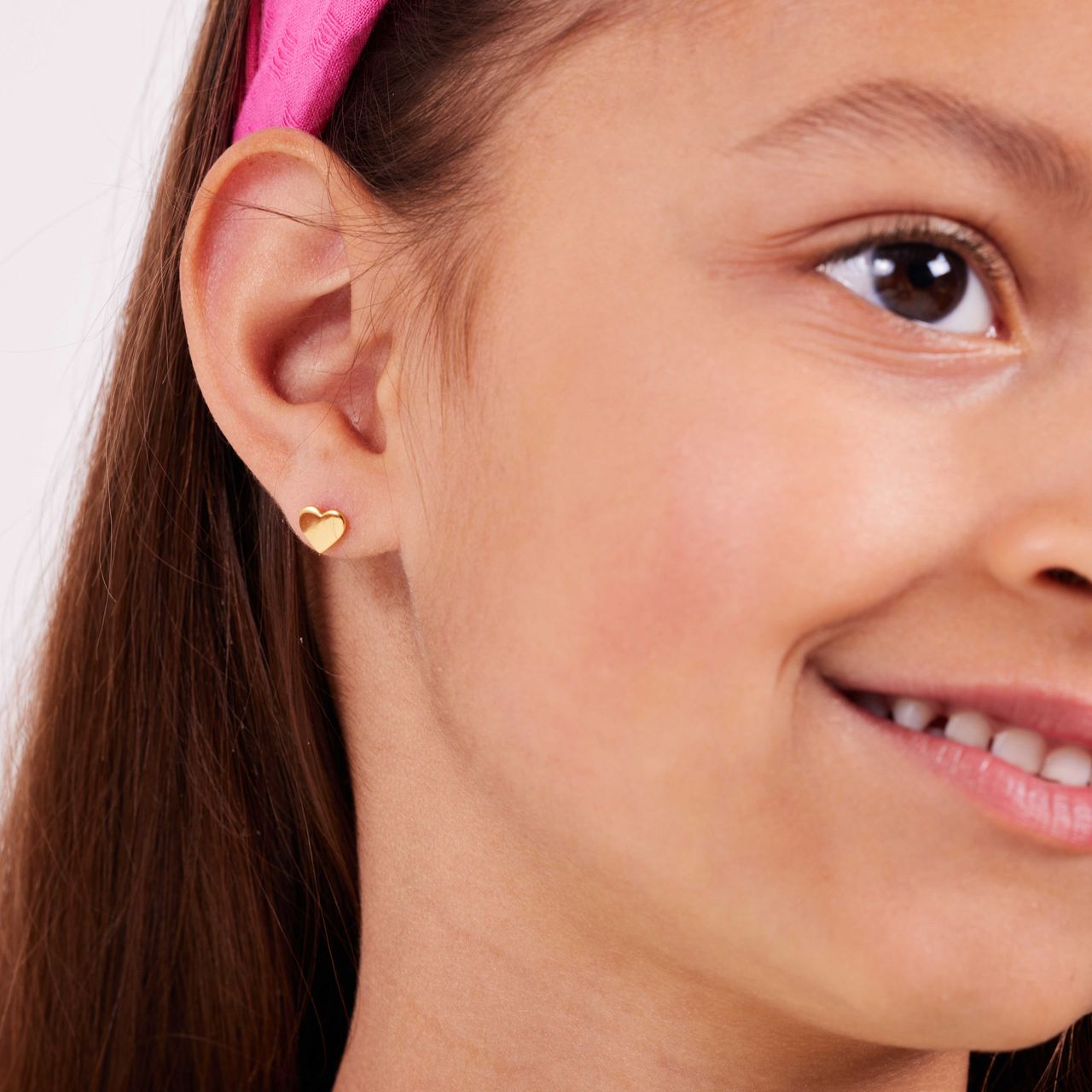 Zilveren goldplated kinderoorknoppen hart