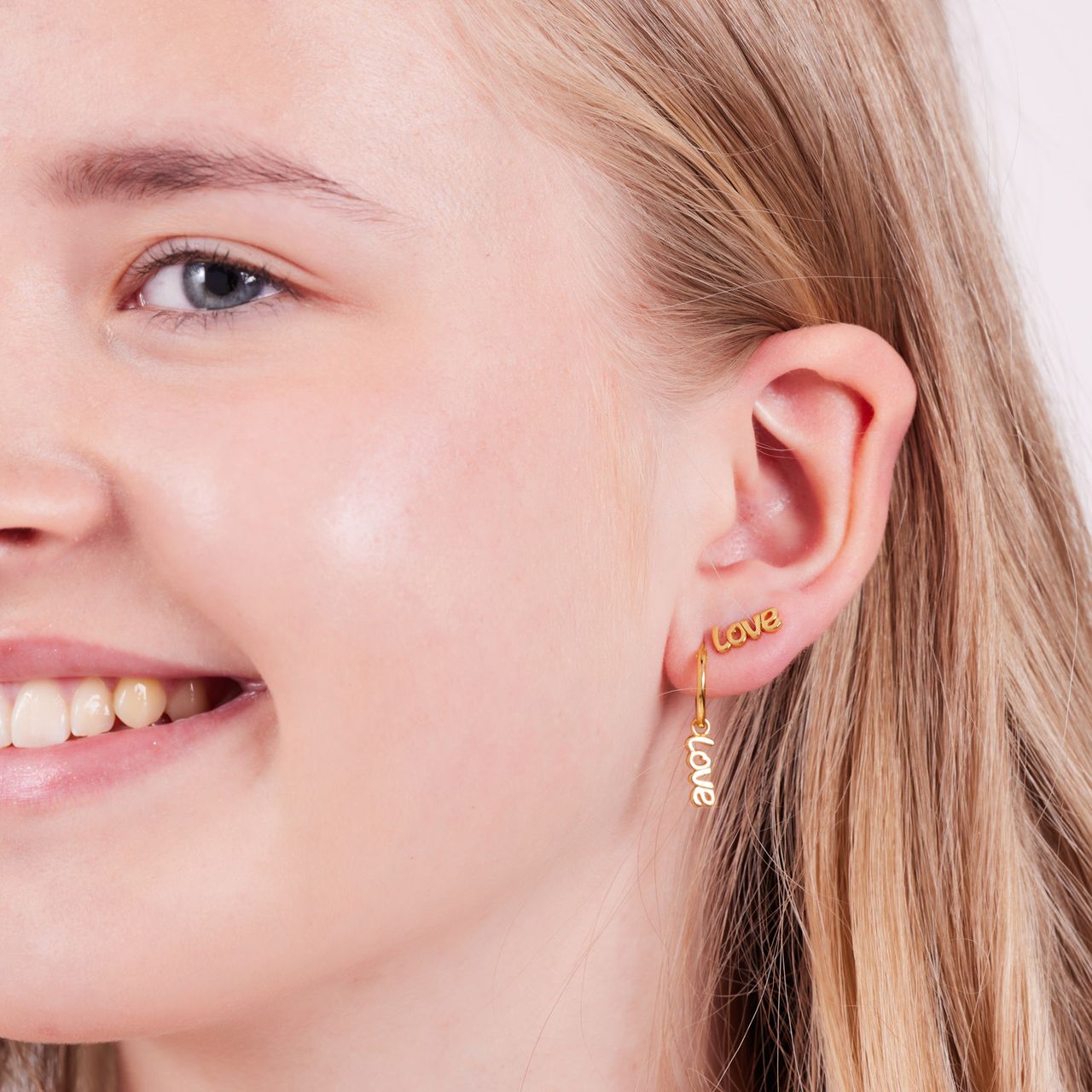 Zilveren goldplated kinderoorknoppen love