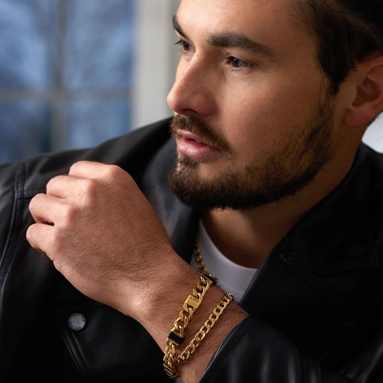 Stalen goldplated herenschakelarmband