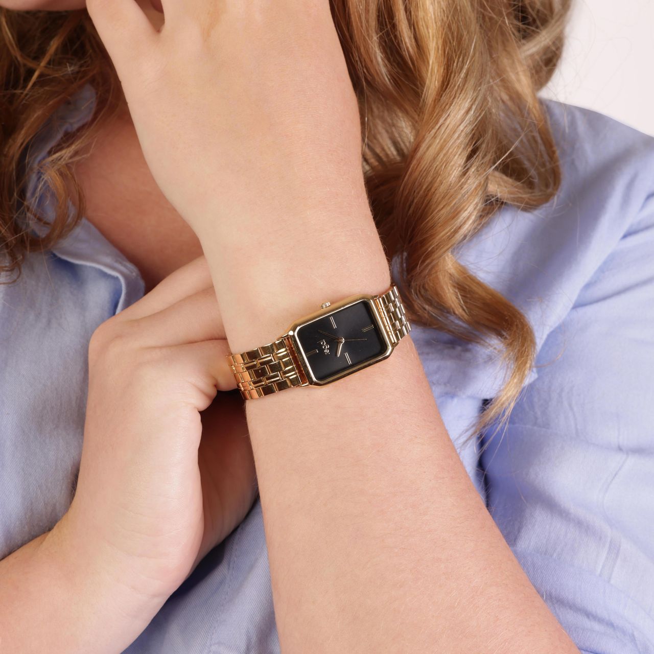 Regal-Damenarmbanduhr mit goldfarbenem Armband