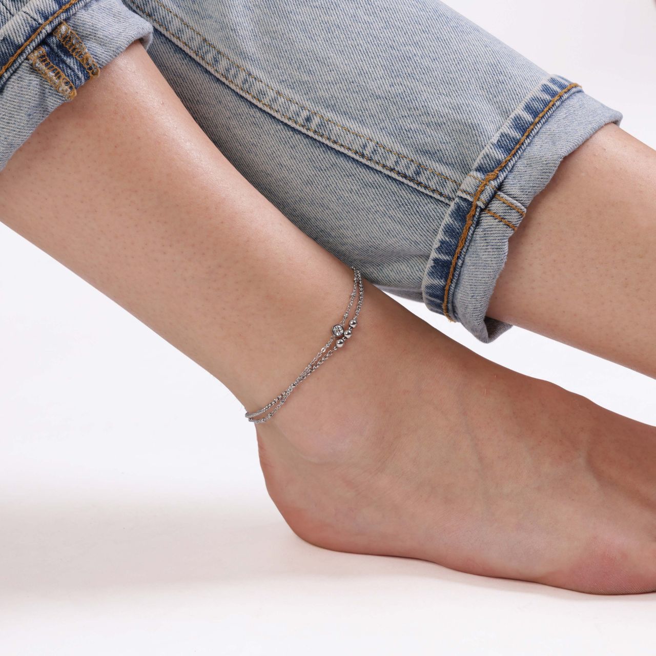 Gerecycled dubbele stainless steel enkelbandje met een steentje