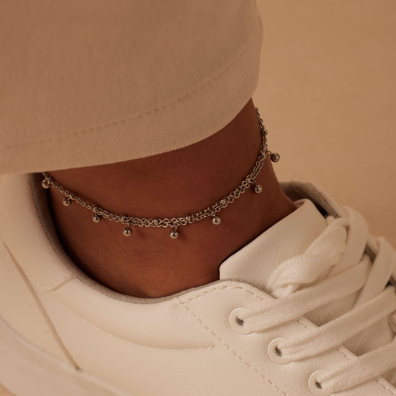 Gerecycled dubbele stainless steel enkelband met bedeltjes