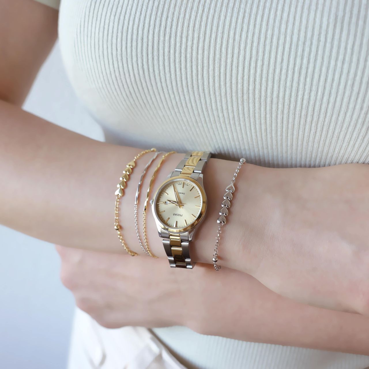 Zilveren goldplated armband hartjes