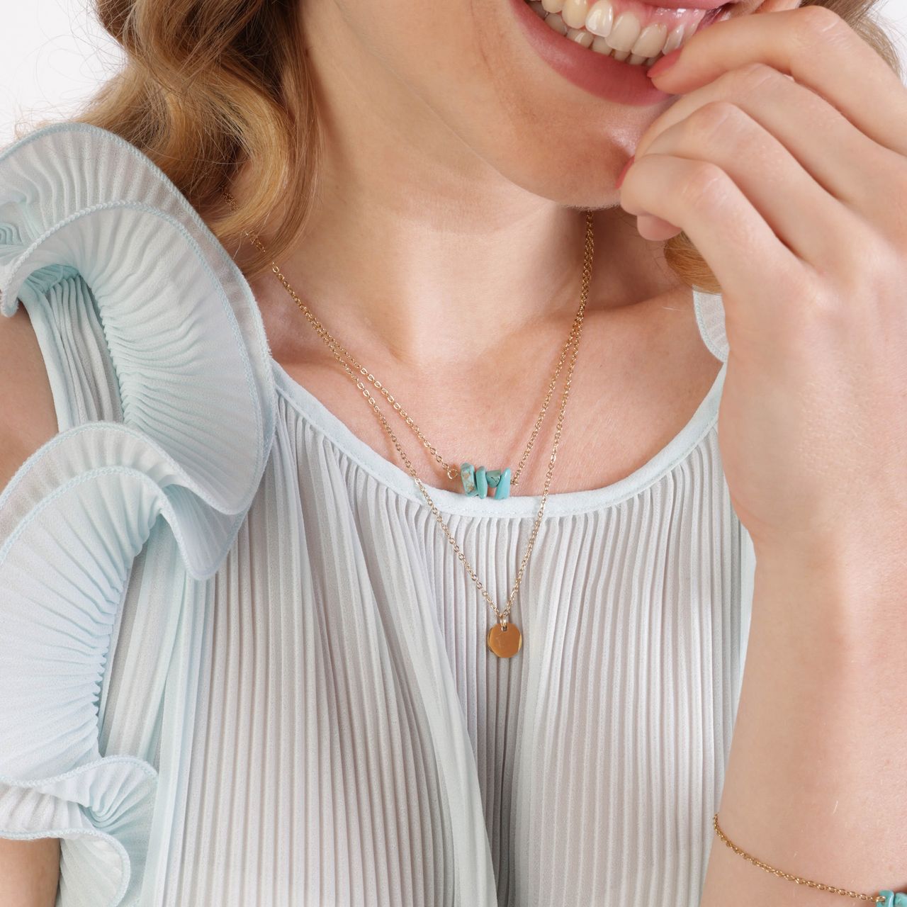 Stainless steel goldplated ketting met muntje en turquoise