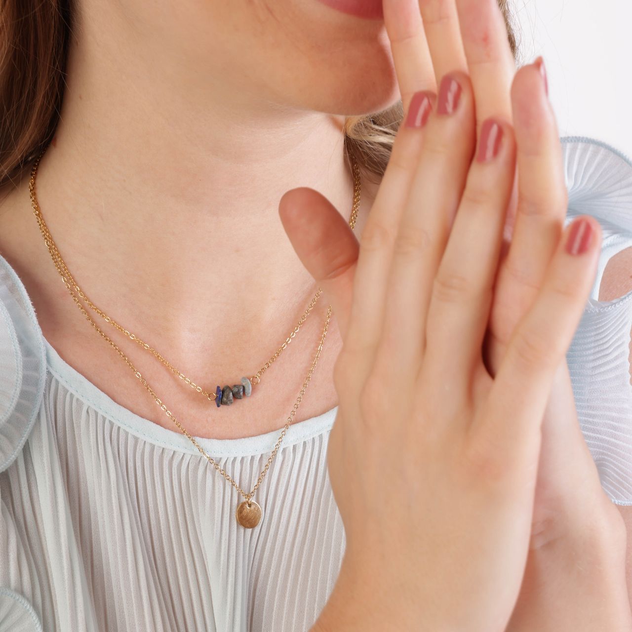 Stainless steel goldplated ketting met muntje en lapis