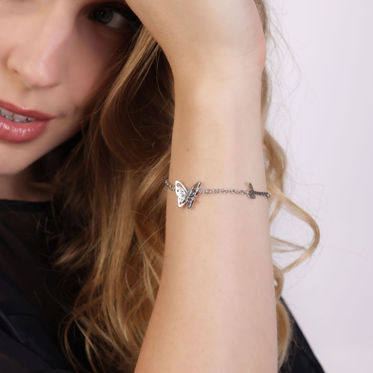 Guess stalen armband met vlinder bedel FLY AWAY