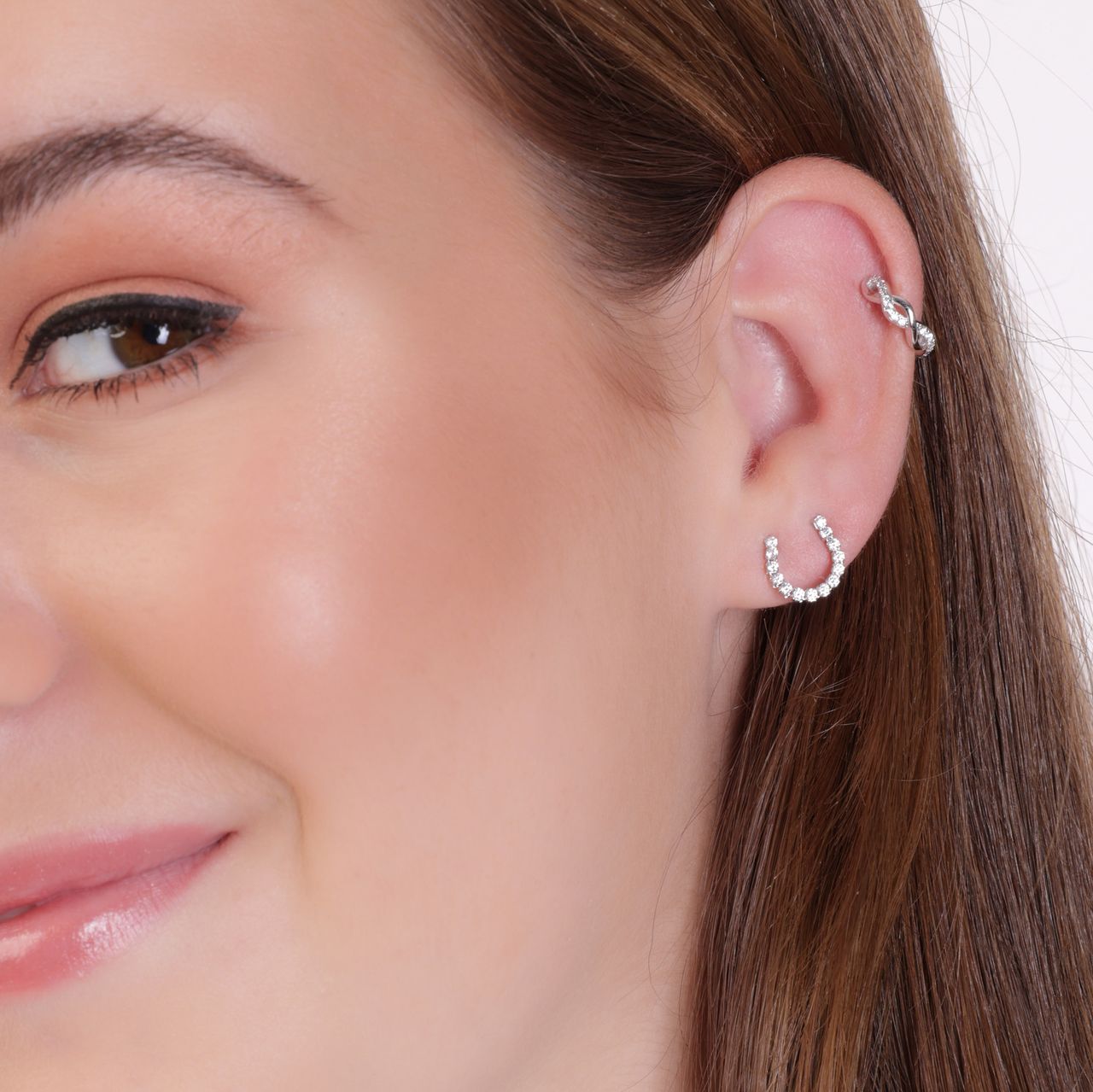 Zilveren earcuff golf zirkonia