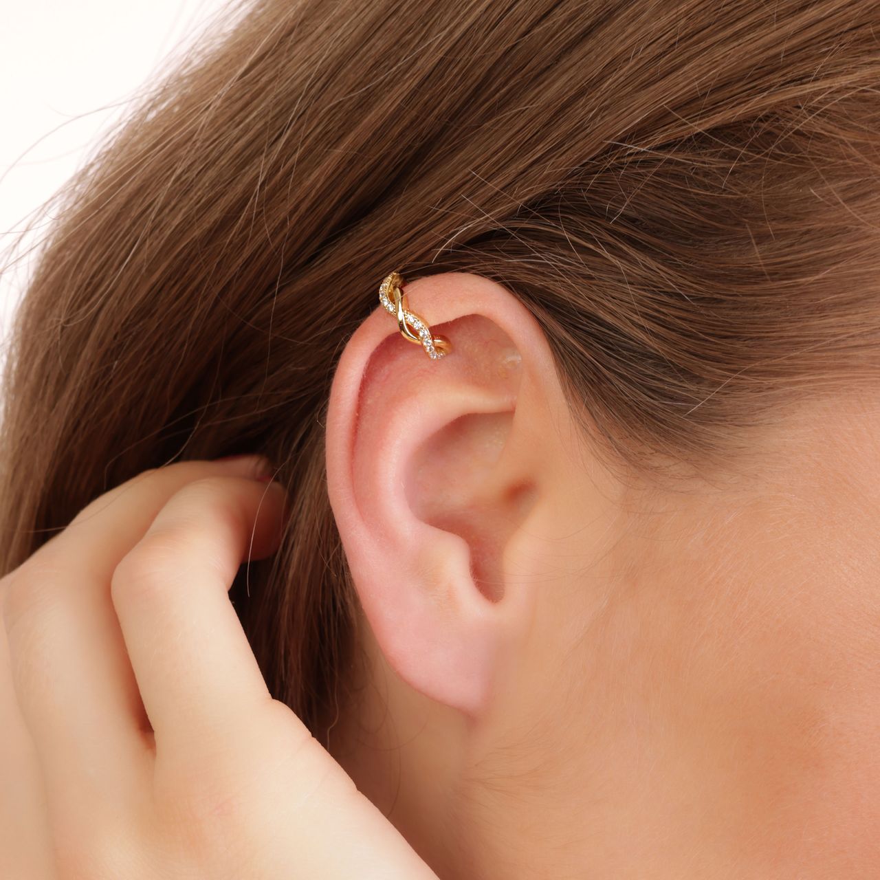 Zilveren goldplated earcuff golf zirkonia