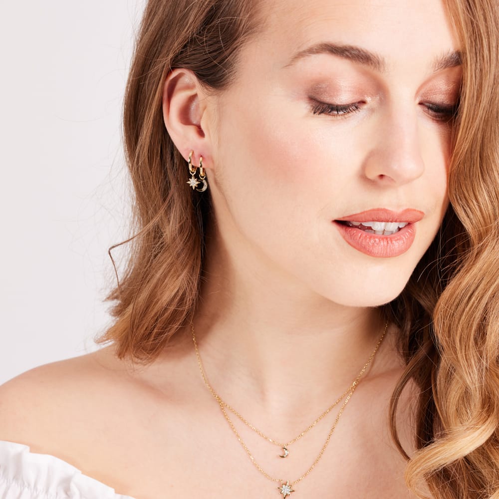 Zilveren set goldplated maan/ster met zirkonia