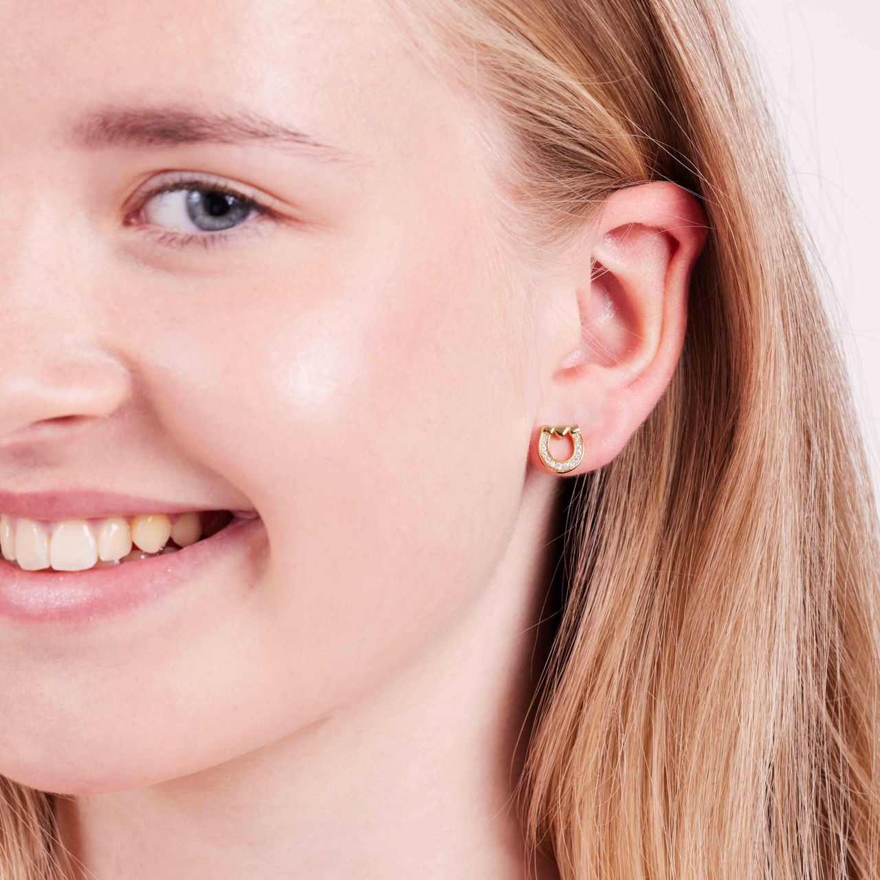 Zilveren goldplated oorknoppen hoefijzer zirkonia