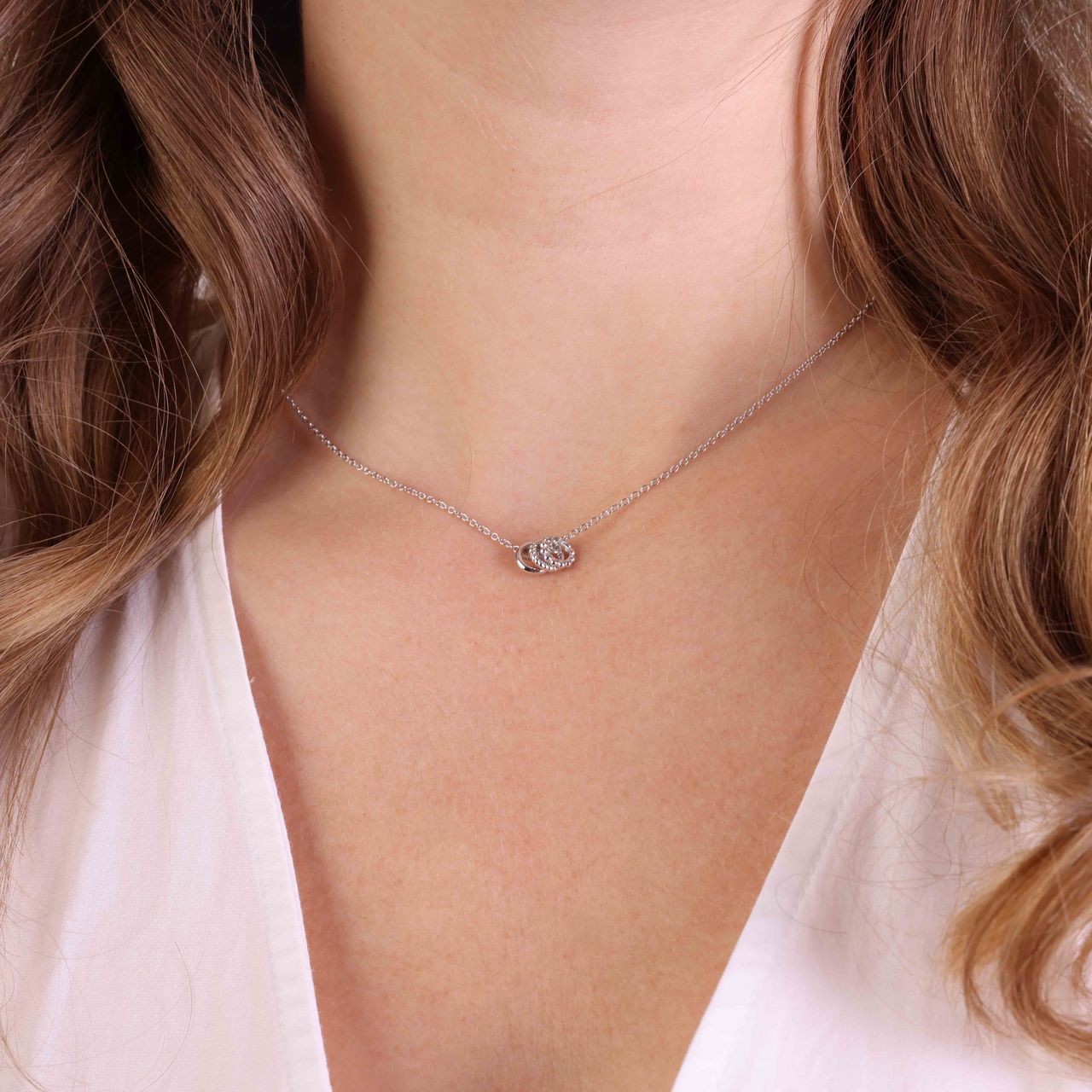 Zilveren ketting met hanger 3ring twisted