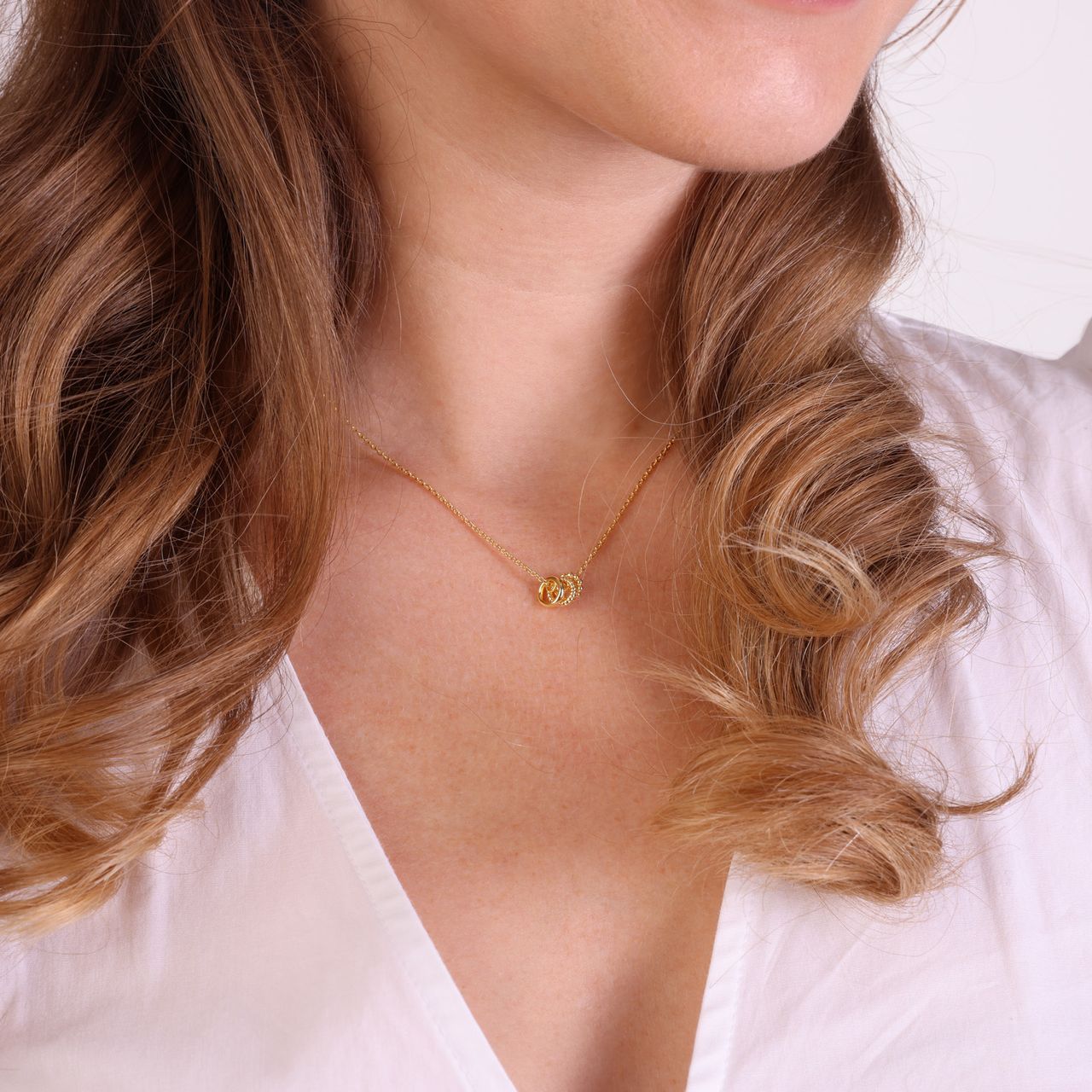 Zilveren goldplated ketting hanger 3ring twisted