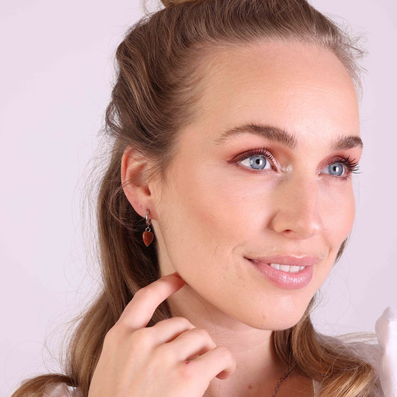 Stainless steel oorbellen met hart zonnesteen