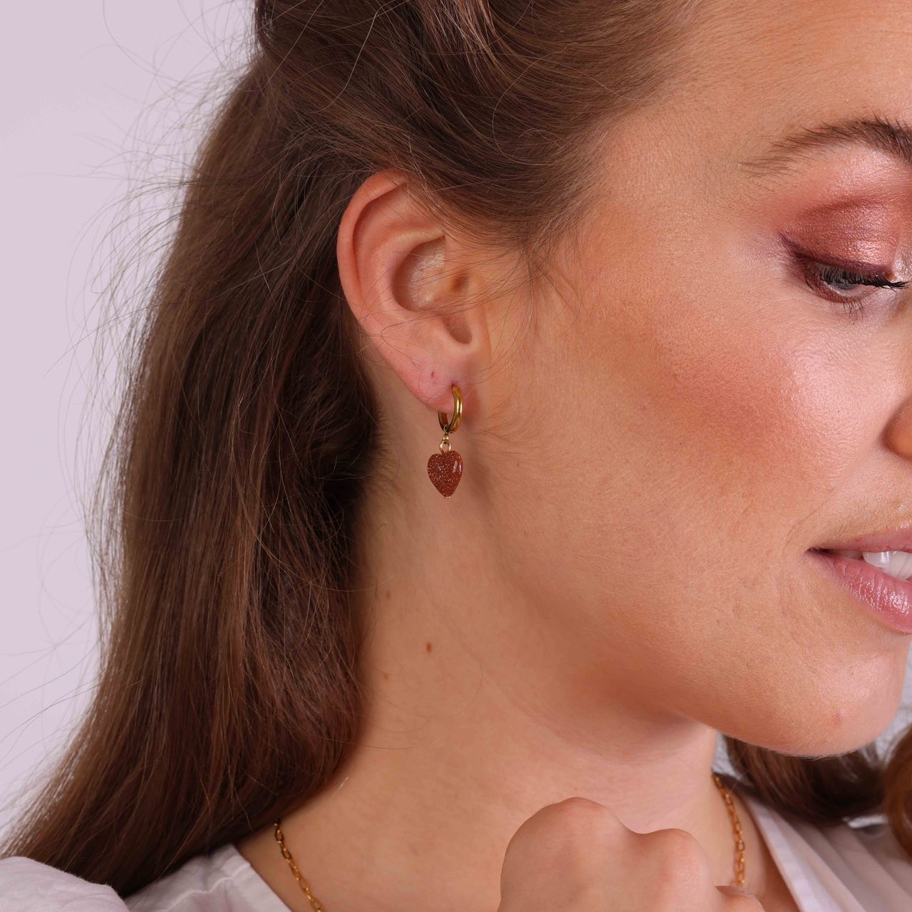 Stainless steel goldplated oorringen met hanger hart met zonnesteen voor dames