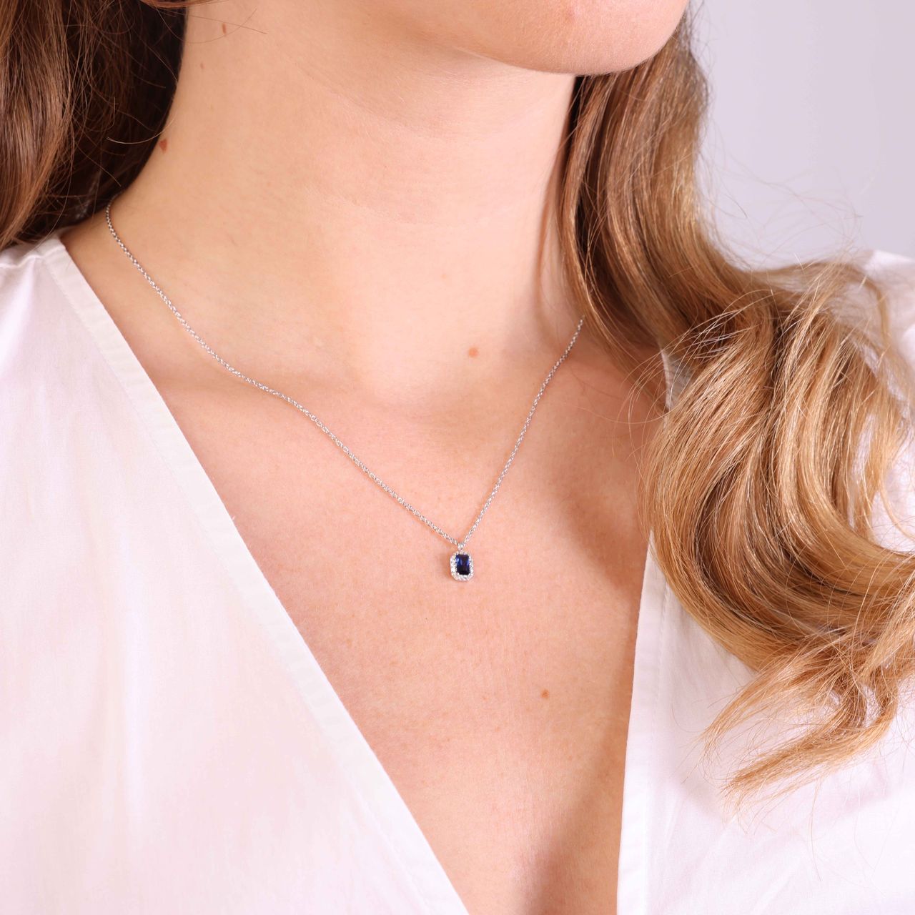 Zilveren ketting hanger rechthoek zirkonia blauw