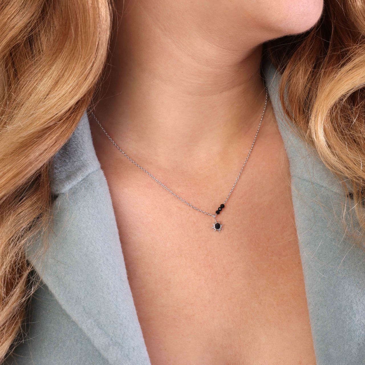 Zilveren ketting met hanger zon zirkonia zwart